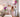 Elegant wall decal set of large hand-painted blossom flowers in soft pink, purple, cream, and burgundy tones—ideal for creating a romantic, garden-inspired accent wall in bedrooms or living areas.