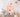 Pink castle wall decal set with soft blue clouds and charming fairy-tale details, creating a magical and whimsical atmosphere perfect for princess-themed children's rooms.