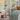 Playful dog wall decal set featuring hand-painted illustrations of various dog breeds, including a golden retriever chasing a frisbee, a pug licking ice cream, a dachshund on a skateboard, a Dalmatian in a fireman’s hat, a corgi, a poodle with a flower, a border collie, and more. Set against a soft gray wall, this cheerful design brings energy and fun to any nursery, playroom, or dog-themed kids’ space.
