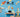 Playful outer space wall decals on a blue wall, featuring a smiling astronaut, colorful rockets, planets, meteors, a space shuttle, and a friendly green alien waving from a flying saucer.