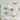 Colorful vintage-style airplane wall decals featuring yellow, blue, and green biplanes flying among soft, fluffy clouds on a light grey background – perfect for a playful, aviation-themed kids' room.