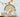 Hand-painted rainbow wall decal in warm earthy tones, including olive green, mustard yellow, terracotta, and coral. Surrounded by small heart illustrations in matching colors and watercolor-style blue clouds, the design creates a cheerful, nature-inspired atmosphere—perfect for nurseries, kids’ rooms, or play areas.