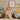 Savanna animal wall decal set featuring soft, hand-painted illustrations of a zebra, elephant, lion, giraffe, rhino, meerkat, and ostrich. Set against a warm taupe wall in a cozy nursery, the design creates a playful safari scene filled with natural textures and earthy tones—perfect for kids' rooms inspired by wildlife and adventure.